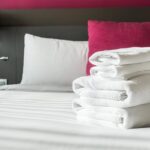 folded-towels-on-bed